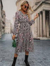 BEAUTIFUL I AM Animal Print Smocked Surplice Long Sleeve Dress