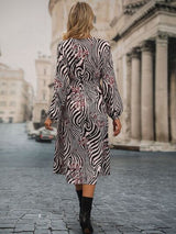 BEAUTIFUL I AM Animal Print Smocked Surplice Long Sleeve Dress